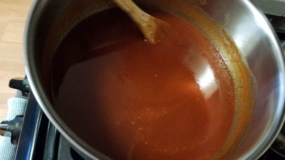 spicy BBQ sauce cooking
